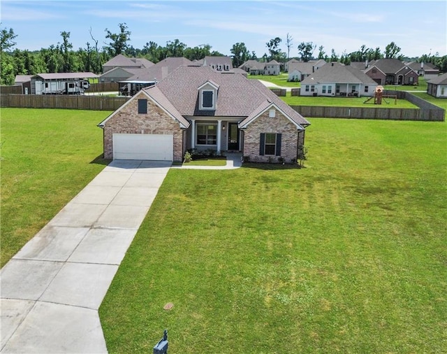9508 E Terran Ln, Waggaman, LA 70094 - traditional-style house featuring driveway, a residential view, and brick siding