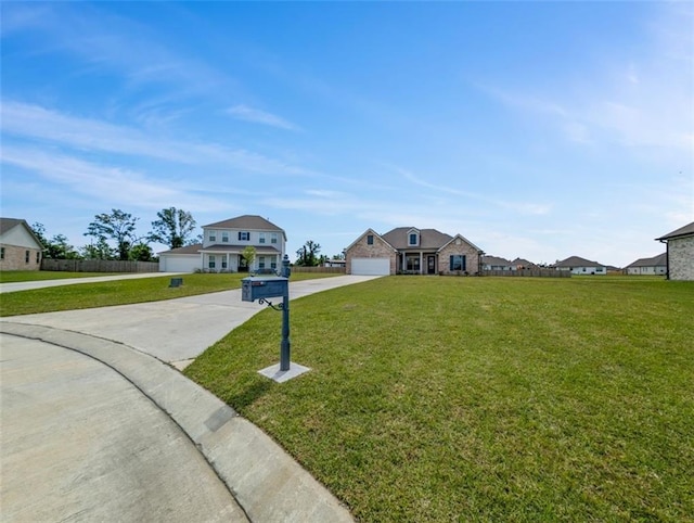 9508 E Terran Ln, Waggaman, LA 70094 - traditional-style house with driveway, a front lawn, and a garage