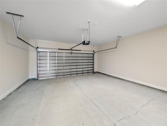 9508 E Terran Ln, Waggaman, LA 70094 - garage with a garage door opener and baseboards