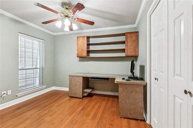 1601 Carthage Dr, Marrero, LA 70072 - unfurnished office with light wood-type flooring, baseboards, a ceiling fan, built in study area, and crown molding