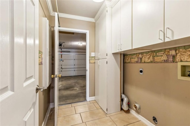 1601 Carthage Dr, Marrero, LA 70072 - clothes washing area with light tile patterned flooring, baseboards, cabinet space, electric dryer hookup, and ornamental molding