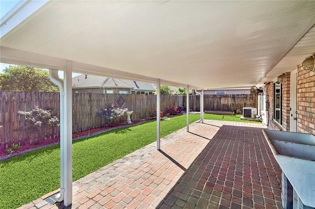 1601 Carthage Dr, Marrero, LA 70072 - view of patio / terrace with a fenced backyard and central air condition unit