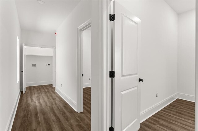 201012 N Dorgenois St, New Orleans, LA 70119 - corridor featuring dark wood-style floors and baseboards