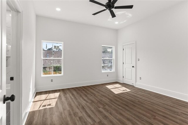 201012 N Dorgenois St, New Orleans, LA 70119 - unfurnished room featuring a healthy amount of sunlight, recessed lighting, dark wood-style floors, and baseboards