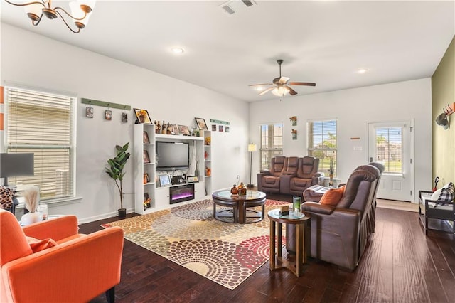 42403 Tigers Eye Stone Ave, Prairieville, LA 70769 - living area featuring ceiling fan with notable chandelier, hardwood / wood-style floors, visible vents, and recessed lighting