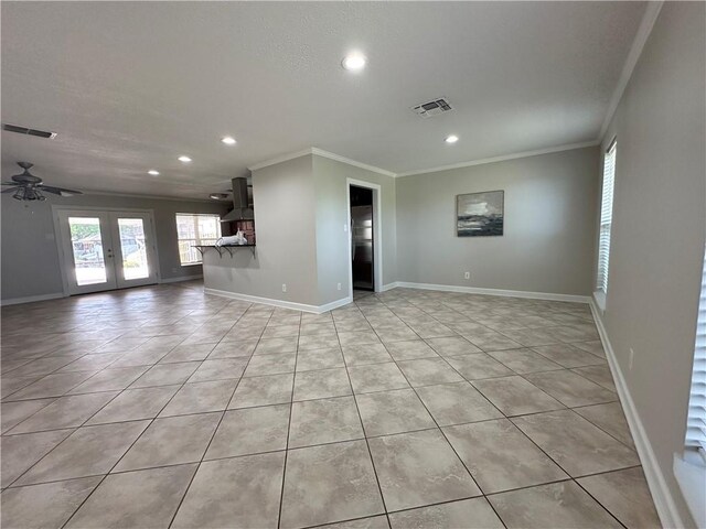 428 Charles Ct, Slidell, LA 70458 - unfurnished living room featuring recessed lighting, ornamental molding, ceiling fan, baseboards, and light tile patterned floors