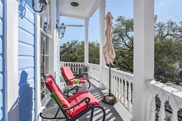 1323 Esplanade Ave Unit C, New Orleans, LA 70116 - balcony featuring a porch