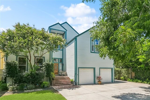 2820 Desoto St, New Orleans, LA 70119 - view of front of home with a garage and concrete driveway