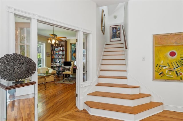 2820 Desoto St, New Orleans, LA 70119 - staircase with wood finished floors and ceiling fan
