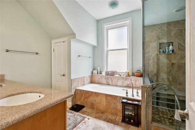 2820 Desoto St, New Orleans, LA 70119 - full bathroom with a bath, vanity, tiled shower, and vaulted ceiling