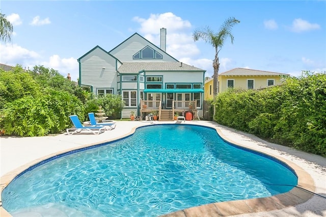 2820 Desoto St, New Orleans, LA 70119 - swimming pool with a patio, a wooden deck, and stairway