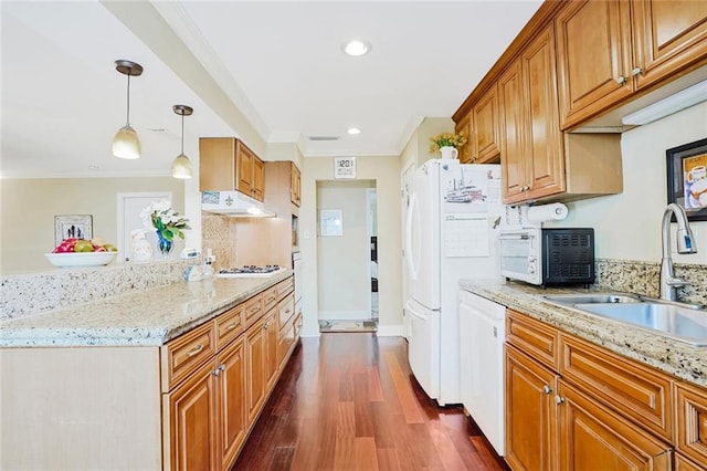 9621 Charlotte Dr, River Ridge, LA 70123 - kitchen featuring white appliances, under cabinet range hood, brown cabinets, dark wood-style flooring, and crown molding