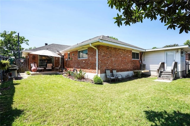 9621 Charlotte Dr, River Ridge, LA 70123 - rear view of property featuring brick siding and a patio area