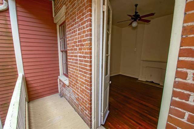 balcony featuring a ceiling fan