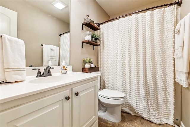 39521 Rue Royale, Prairieville, LA 70769 - bathroom with tile patterned floors, vanity, curtained shower, and toilet