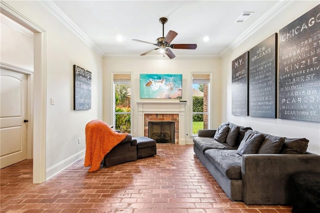 living area featuring a ceiling fan, crown molding, and brick floor