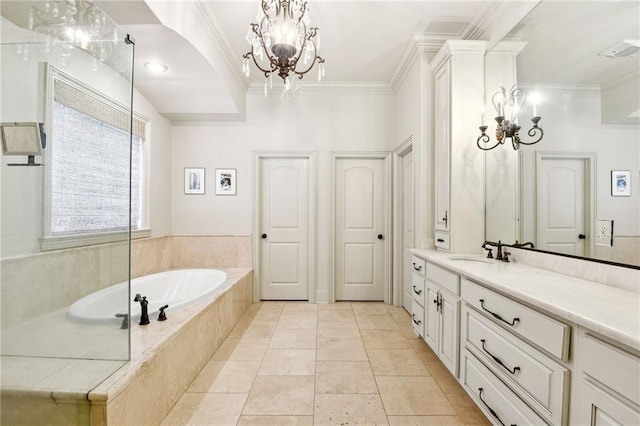bathroom featuring an inviting chandelier, visible vents, vanity, a bath, and crown molding
