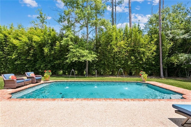 outdoor pool featuring a patio area