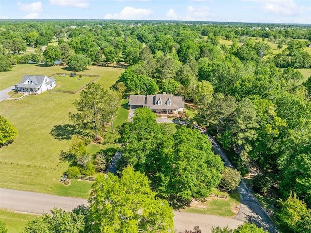aerial view with a wooded view