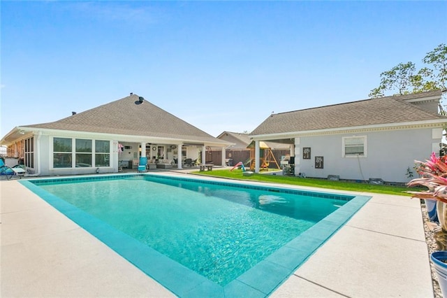 view of swimming pool featuring a patio area and a fenced in pool