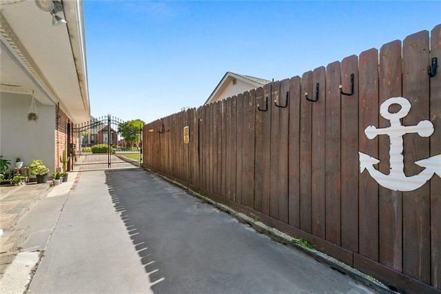 exterior space featuring a gate and fence