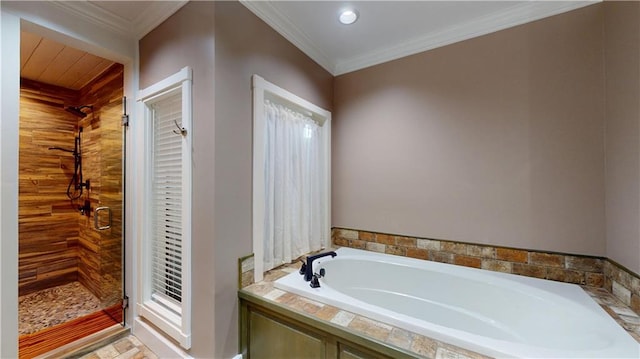 31765 River Pines Dr, Springfield, LA 70462 - bathroom with a shower stall, a garden tub, and crown molding