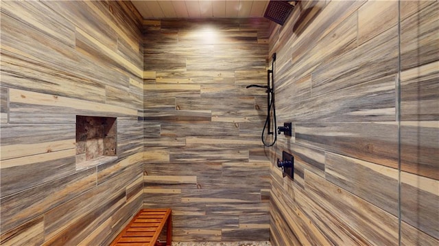31765 River Pines Dr, Springfield, LA 70462 - bathroom with wood walls and tiled shower