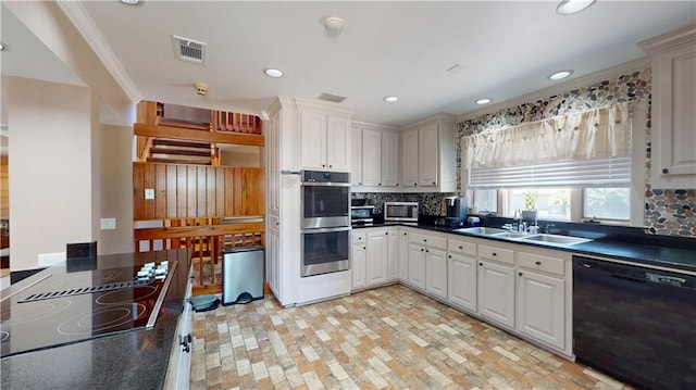 31765 River Pines Dr, Springfield, LA 70462 - kitchen featuring backsplash, dark countertops, visible vents, a sink, and black appliances