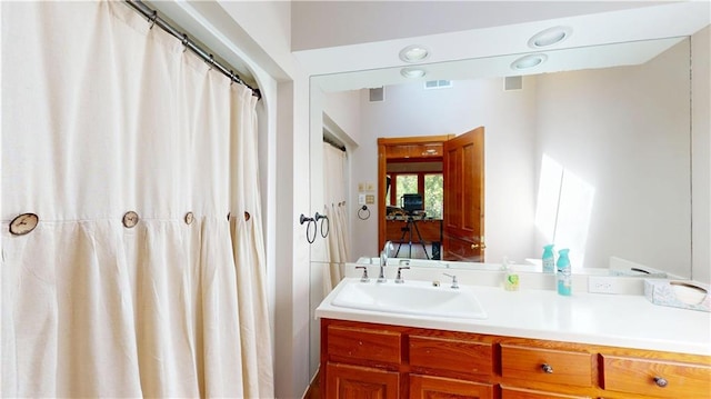 31765 River Pines Dr, Springfield, LA 70462 - bathroom featuring visible vents and vanity