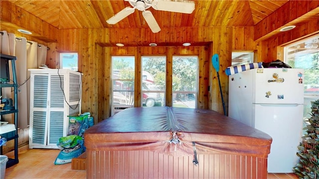31765 River Pines Dr, Springfield, LA 70462 - kitchen with ceiling fan, lofted ceiling, a healthy amount of sunlight, and freestanding refrigerator