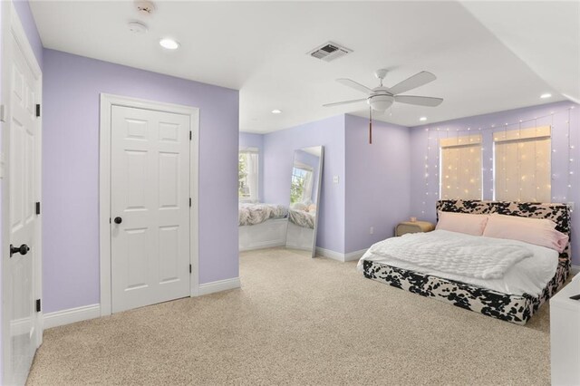 bedroom featuring recessed lighting, carpet floors, visible vents, and baseboards