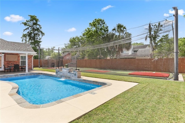 view of swimming pool with a patio area, a fenced backyard, a fenced in pool, and a yard