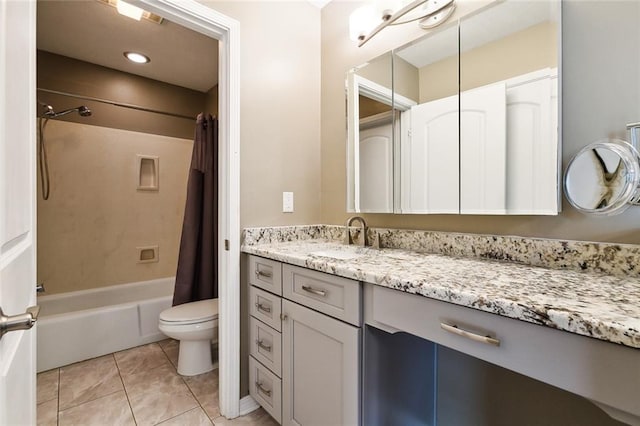 bathroom with tile patterned floors, vanity, toilet, and shower / tub combo with curtain