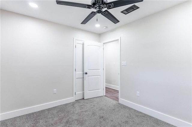 spare room featuring visible vents, recessed lighting, ceiling fan, carpet flooring, and baseboards
