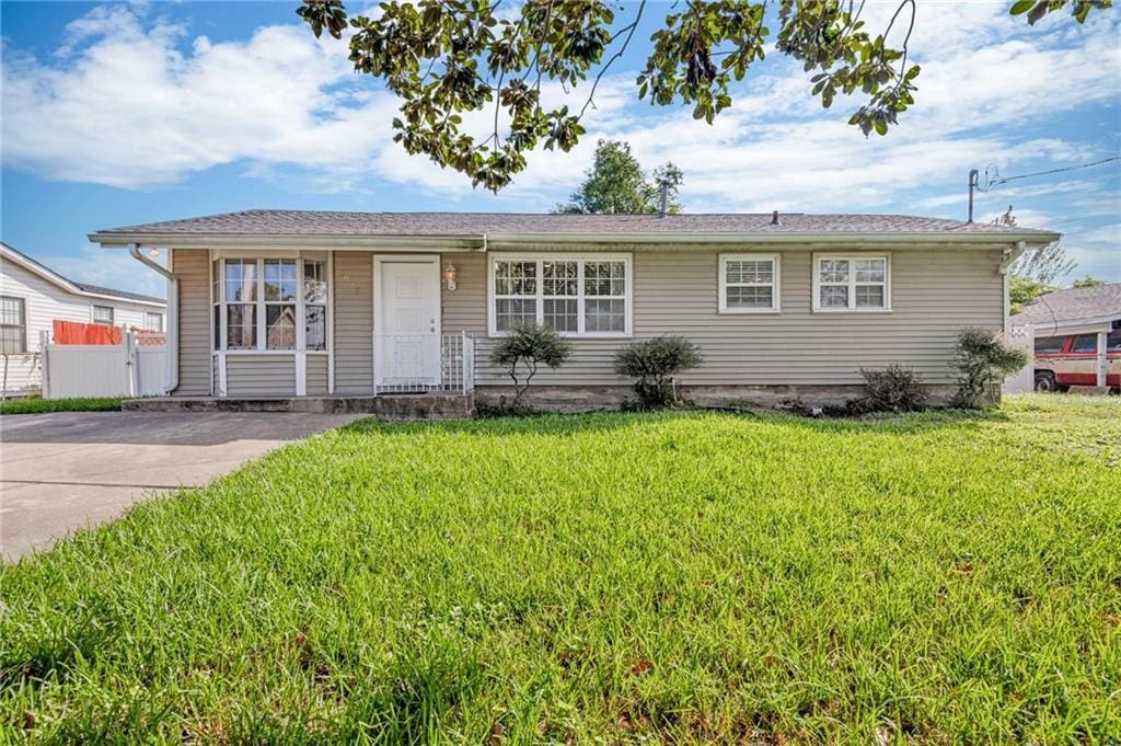 3028 Acron St, Kenner, LA 70065 - ranch-style home with a front lawn