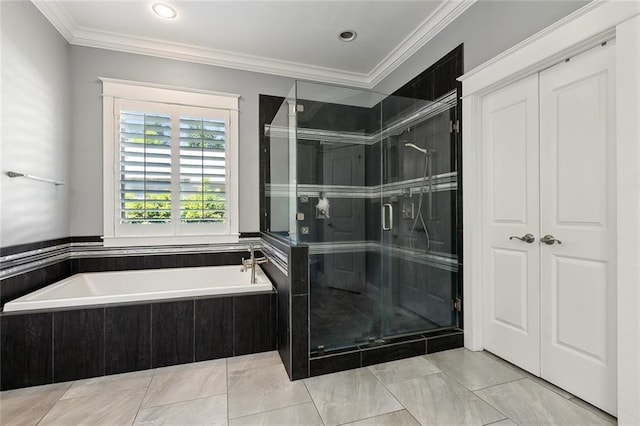 bathroom featuring recessed lighting, a shower stall, a garden tub, and crown molding