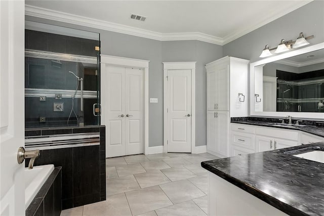 bathroom with visible vents, crown molding, and a shower