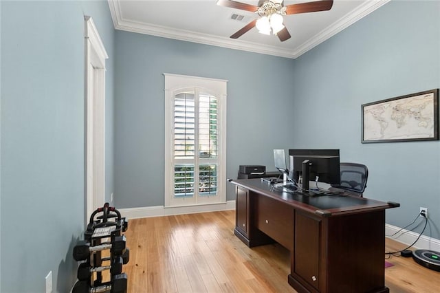 office featuring ceiling fan, baseboards, visible vents, and light wood-type flooring