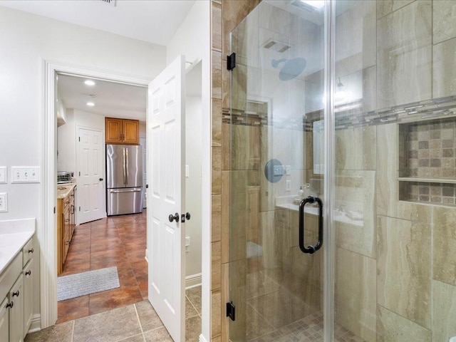 31035 Horseshoe Island Rd, Lacombe, LA 70445 - bathroom featuring recessed lighting, vanity, and a stall shower