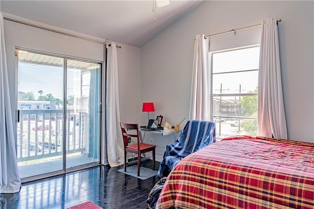 bedroom with access to outside and lofted ceiling