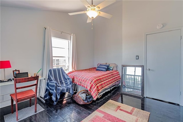 bedroom featuring high vaulted ceiling, ceiling fan, and wood finished floors