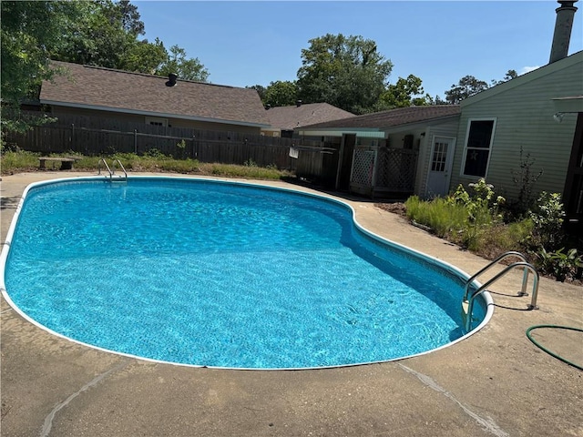 view of pool with fence and a fenced in pool