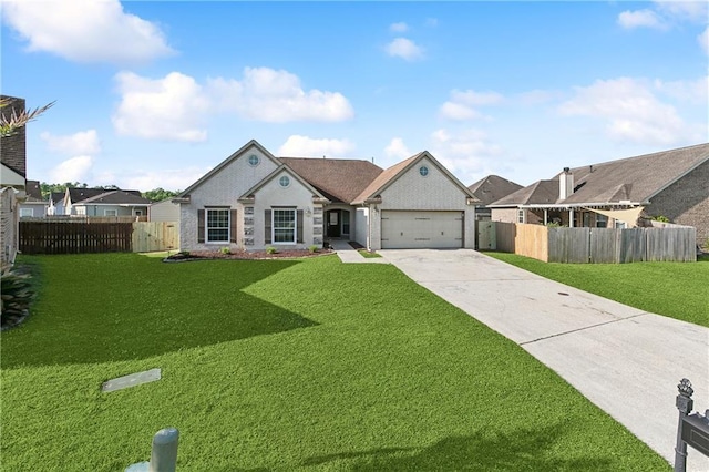 view of front facade featuring fence, driveway, a front yard, and a garage