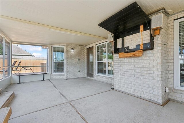 view of patio / terrace with fence