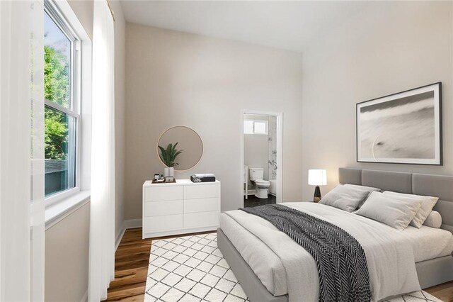 150301 N Rocheblave St, New Orleans, LA 70119 - laundry room featuring wood finished floors, baseboards, and washer hookup