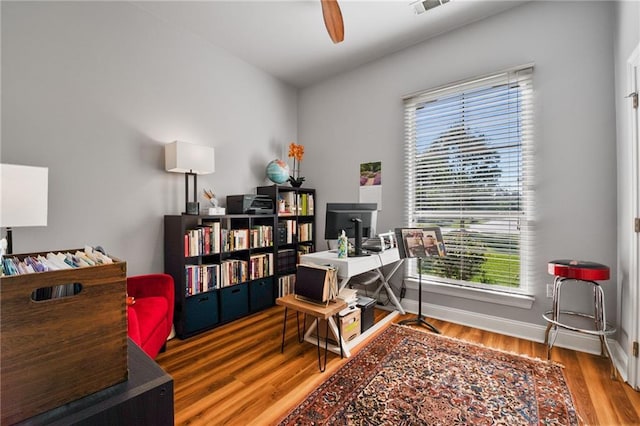 2436 Cours Carson St, Mandeville, LA 70448 - office featuring wood finished floors, baseboards, and ceiling fan