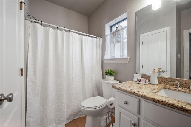 2436 Cours Carson St, Mandeville, LA 70448 - full bathroom featuring toilet, tile patterned flooring, and vanity