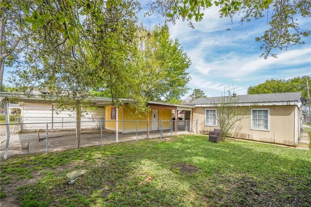 1208 Maine Ave, Kenner, LA 70062 - back of house with a garage