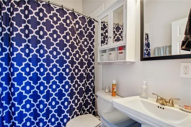 264545 Saint Ann St, New Orleans, LA 70119 - bathroom featuring toilet and a sink