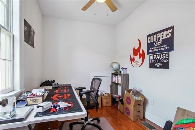 264545 Saint Ann St, New Orleans, LA 70119 - office space featuring ceiling fan and wood finished floors